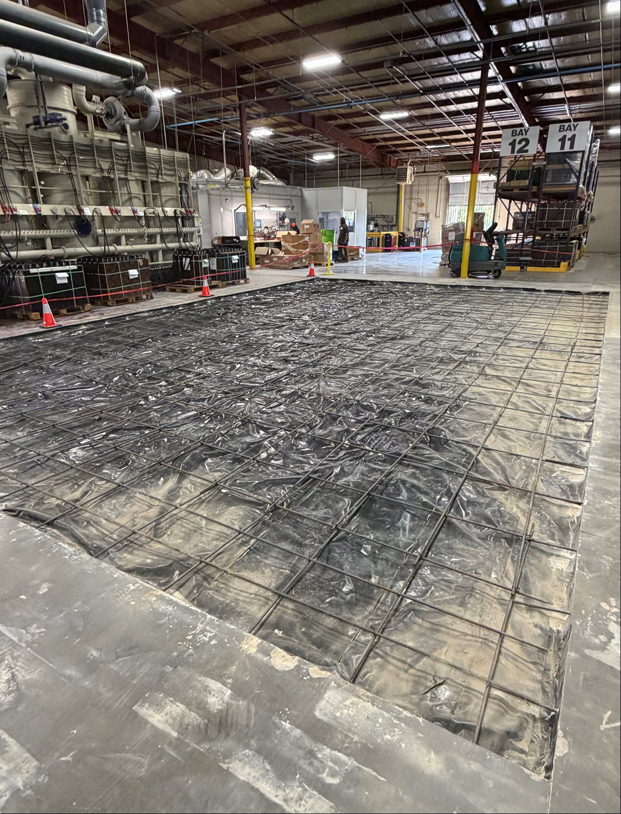 Reinforcing steel prepared for an industrial concrete slab